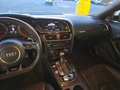 $28K Audi RS5 vs $18K M235i xDrive: The High-Mileage Performance Trap Nobody Talks About